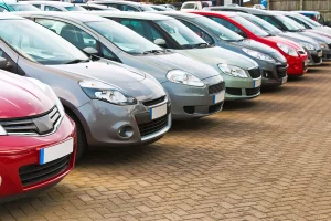 image of cars for sale lined up at a dealership in Montenegro